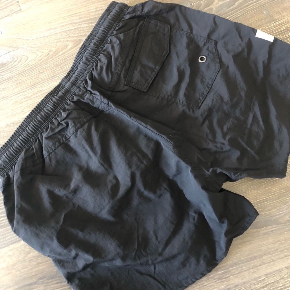 Men’s M black short swim trunks